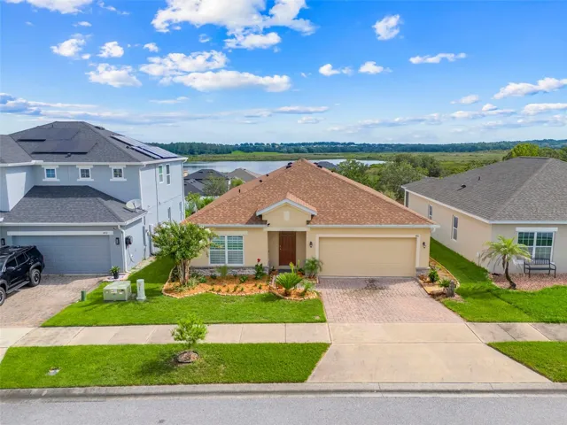 Front of home with lake views