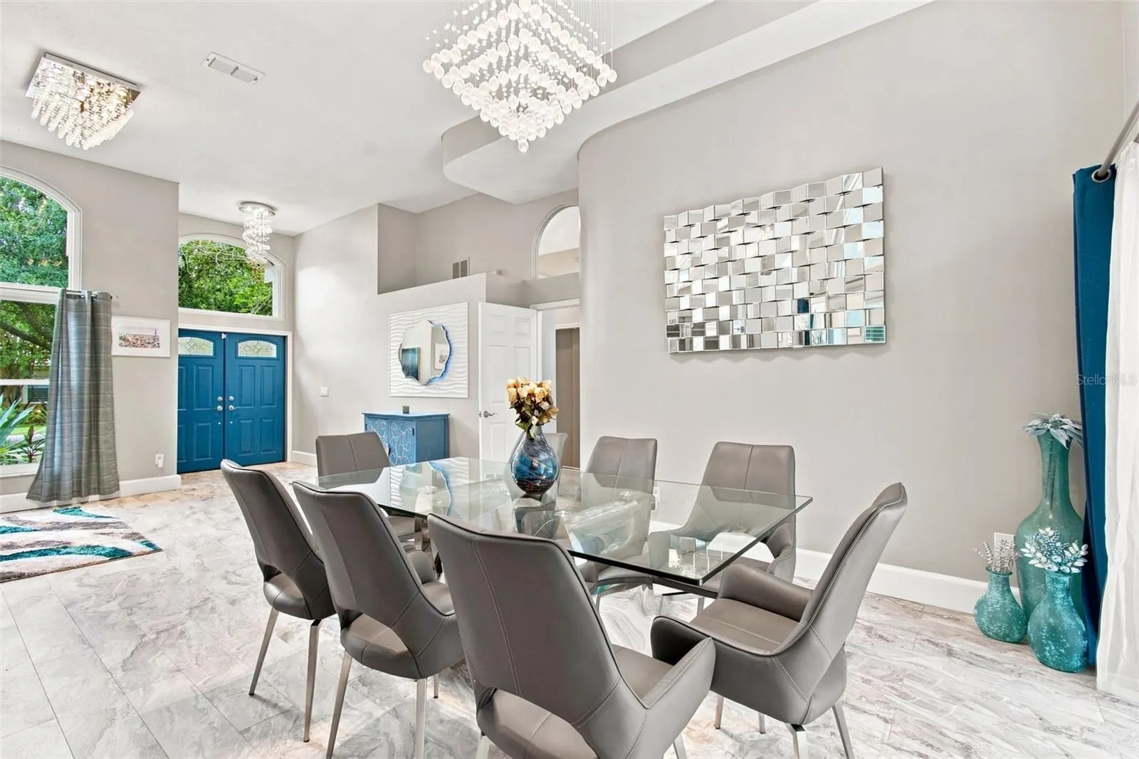 Formal dining room overlooking pool