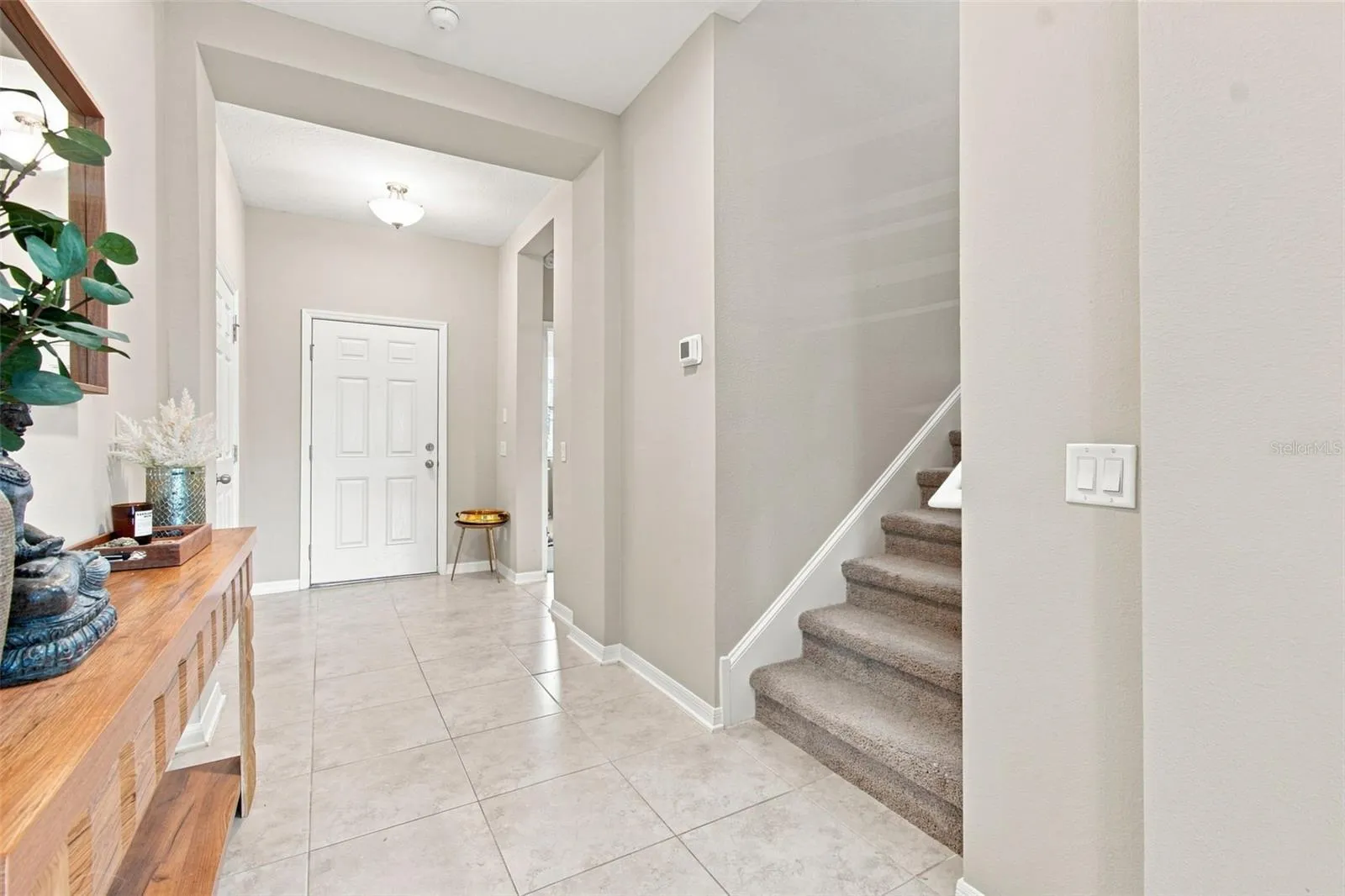 Wide entryway that opens up the home