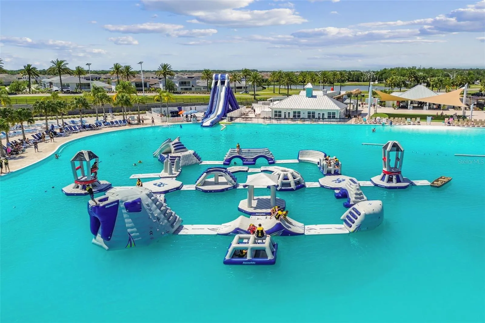 Bounce house in the middle of the lagoon for hours of entertainment