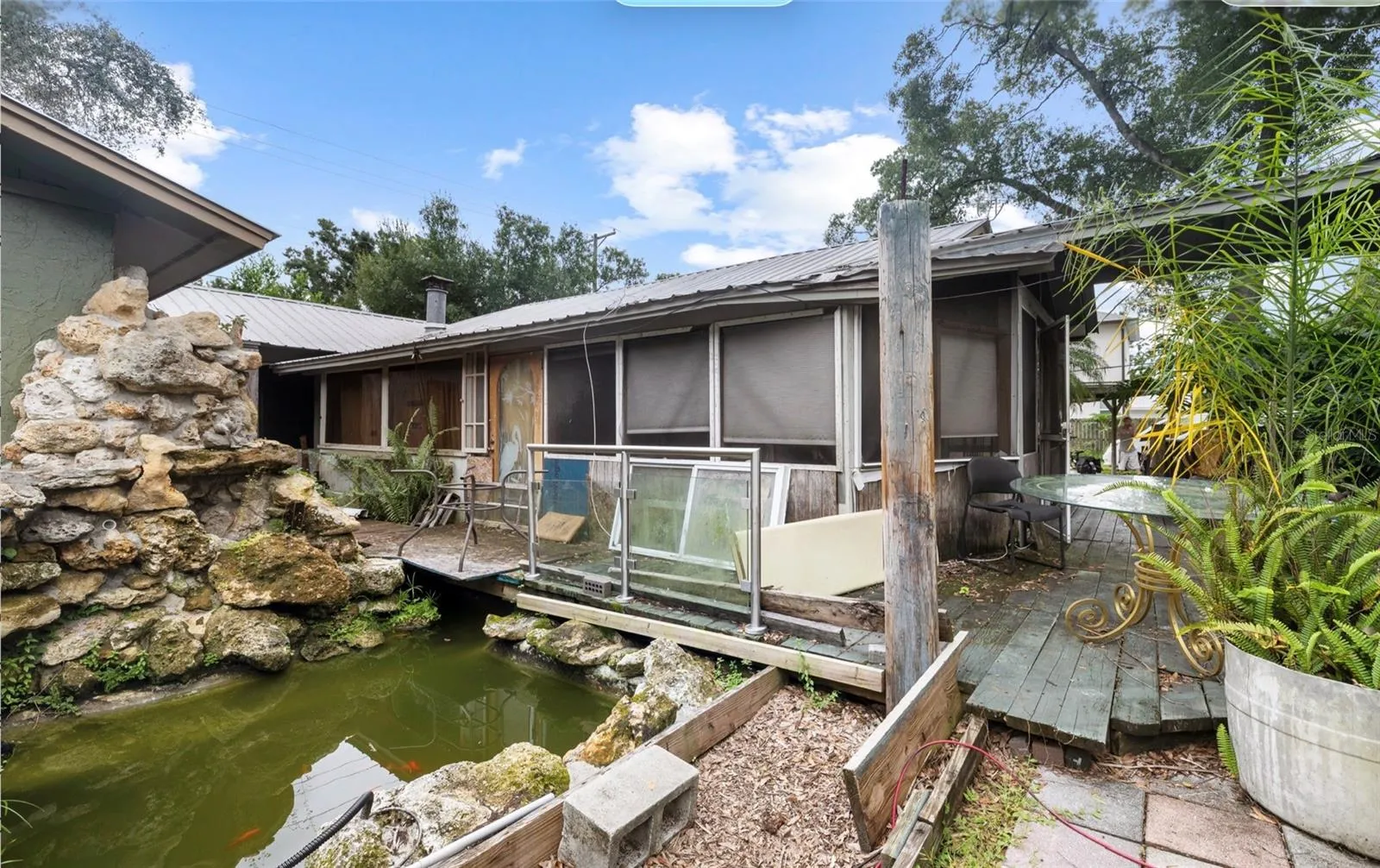 Koi pond and screened in lanai
