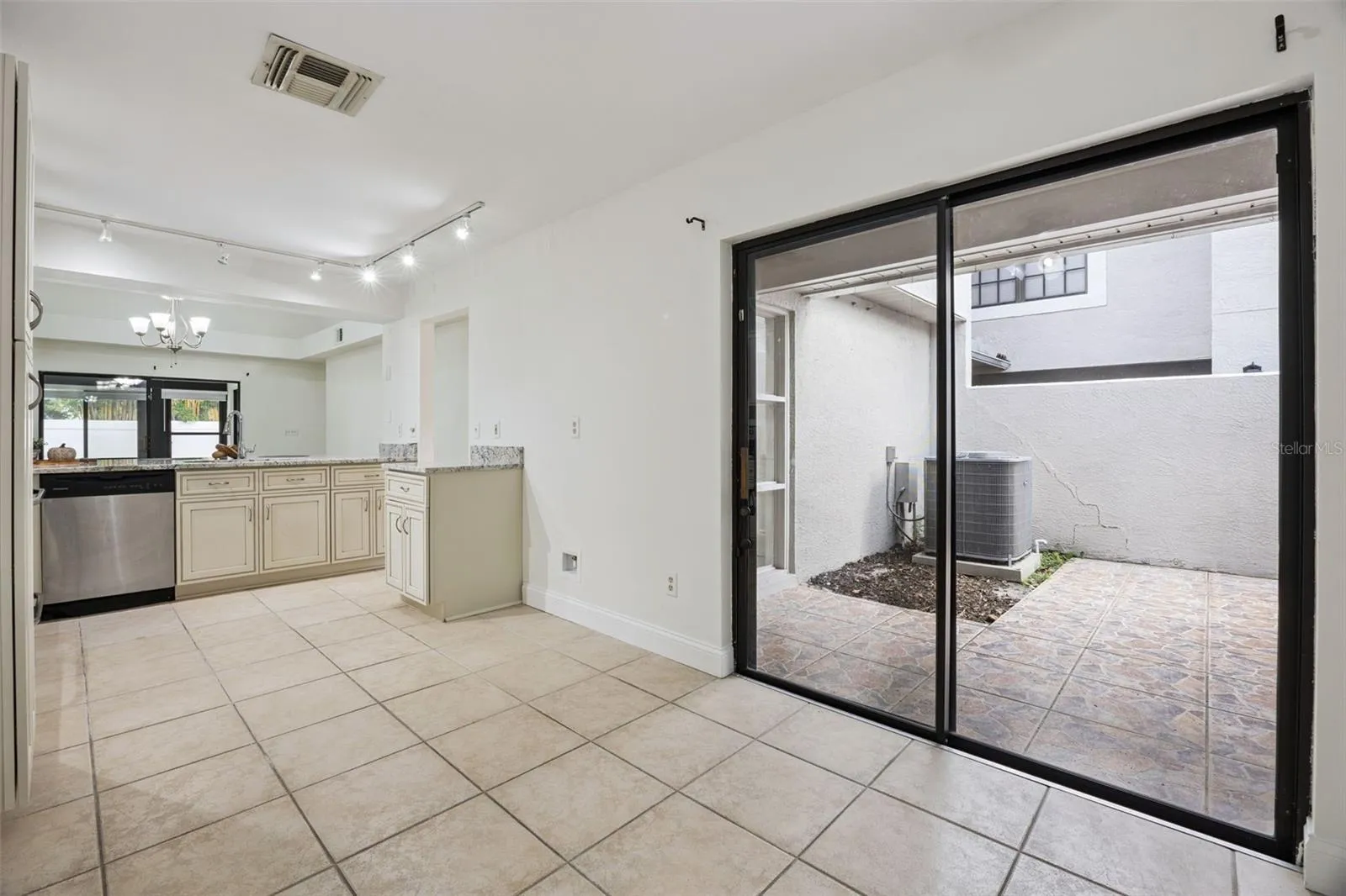 Kitchen with access to entryway