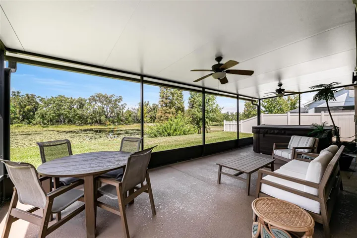Rear enclosed/screened patio