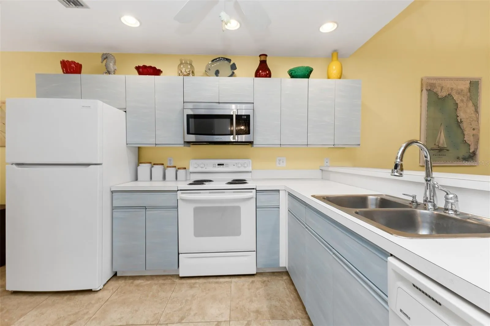 Wide open kitchen, laundry, and bonus flex space.