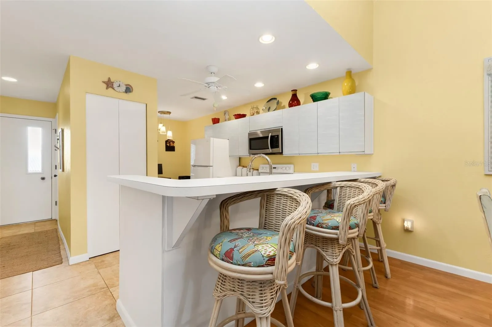 Pull up a stool and relax at the kitchen bar.