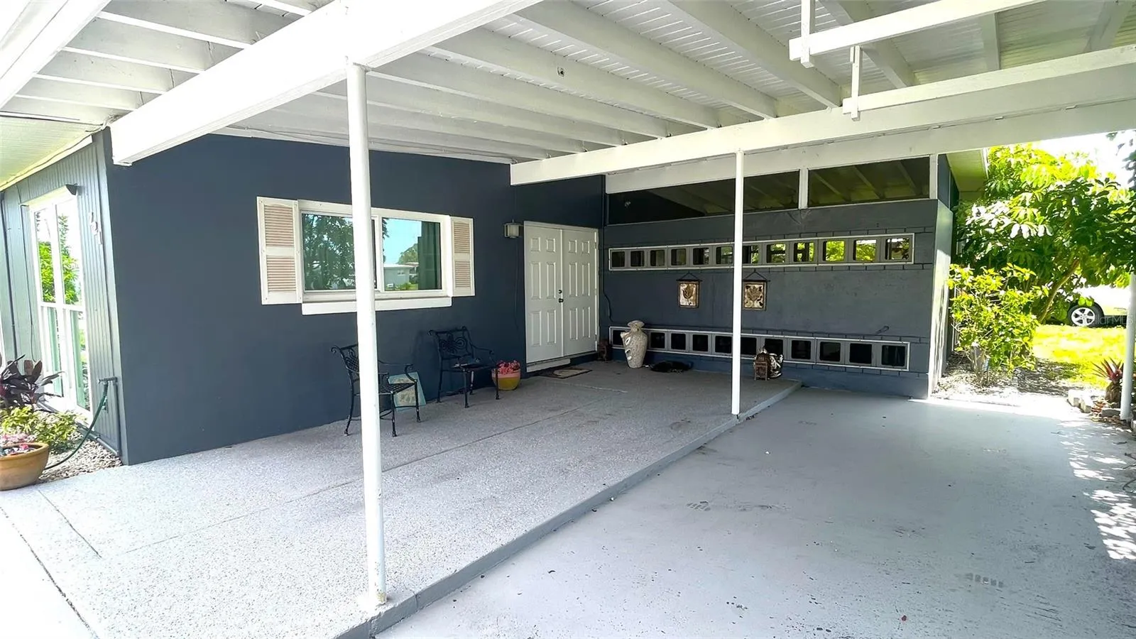 Carport &amp; Double Door front Entry