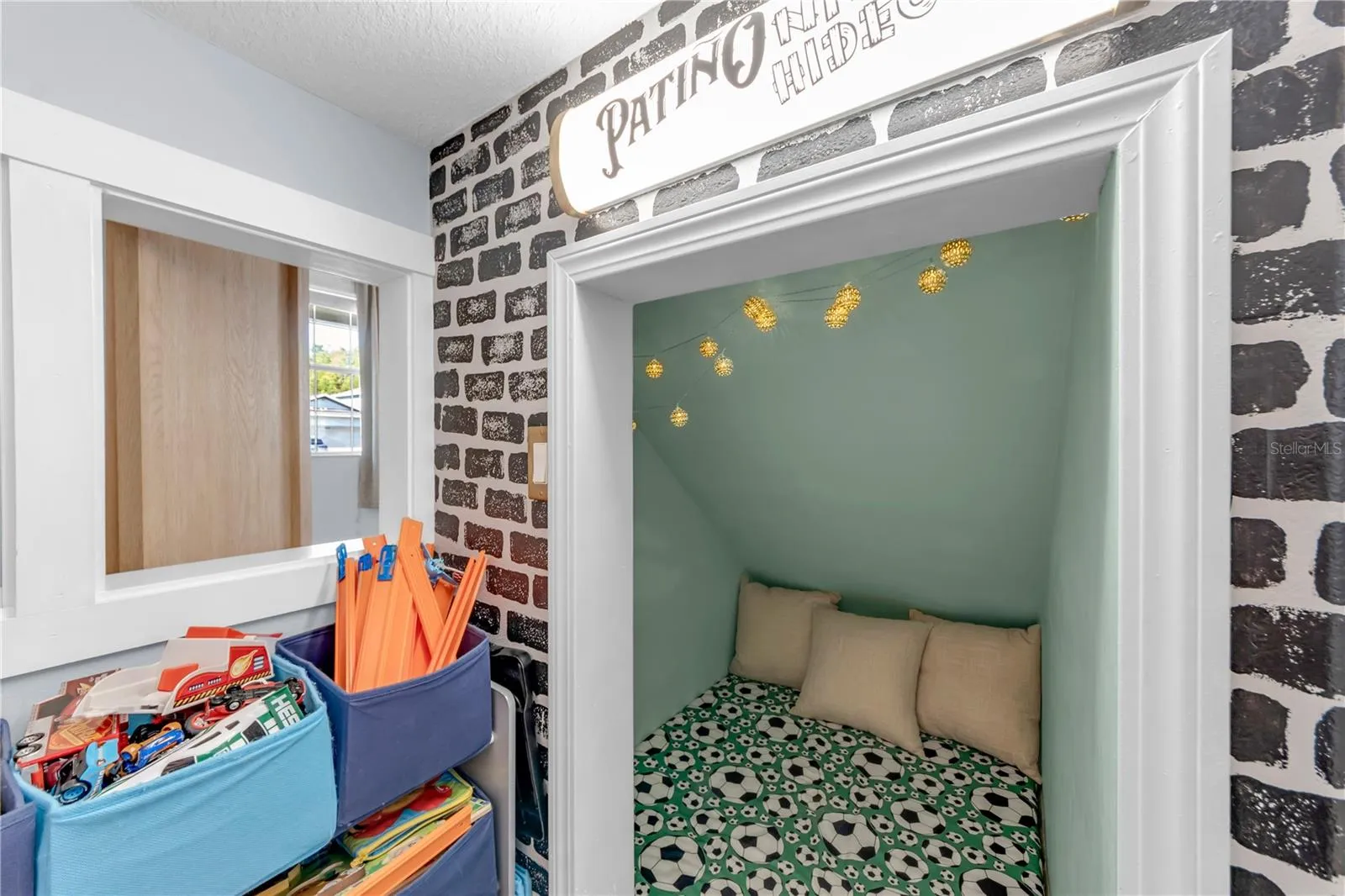 Understairs play nook
