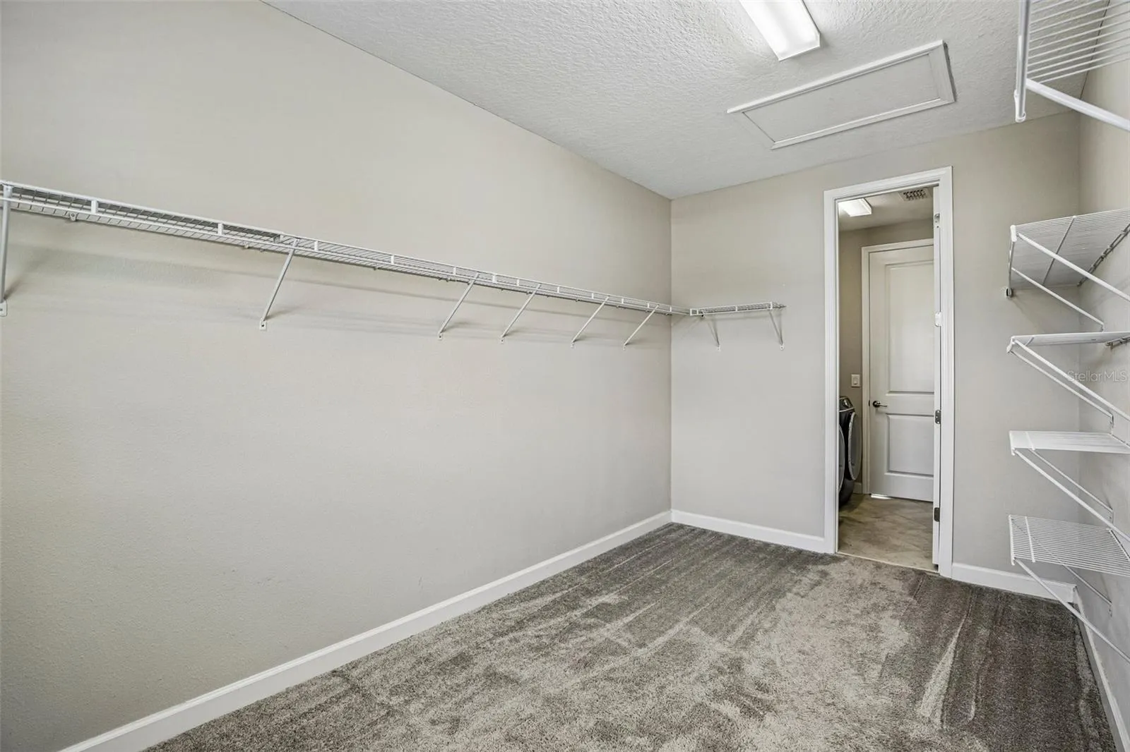 PRIMARY WALK IN CLOSET