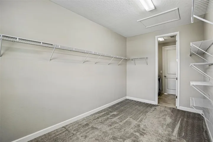 PRIMARY WALK IN CLOSET