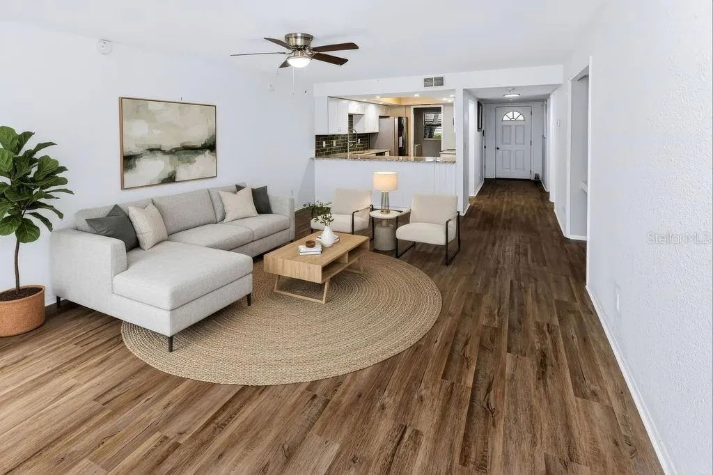 virtual stage living area toward kitchen