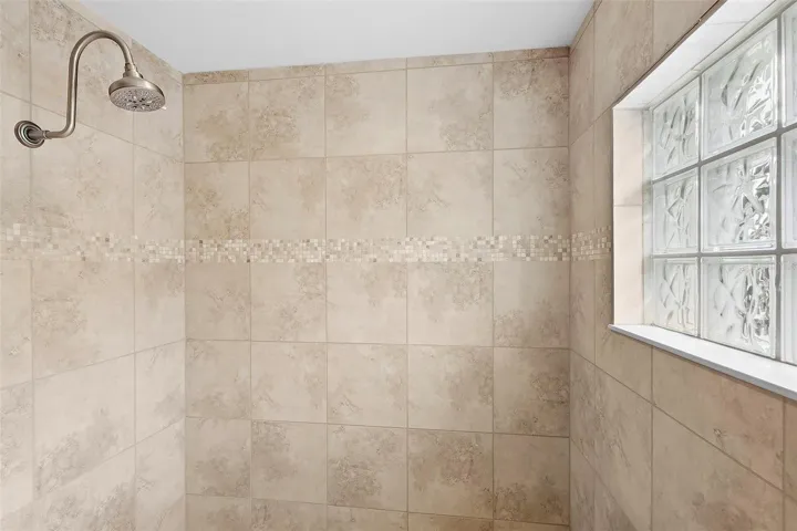 roman tile walk-in shower