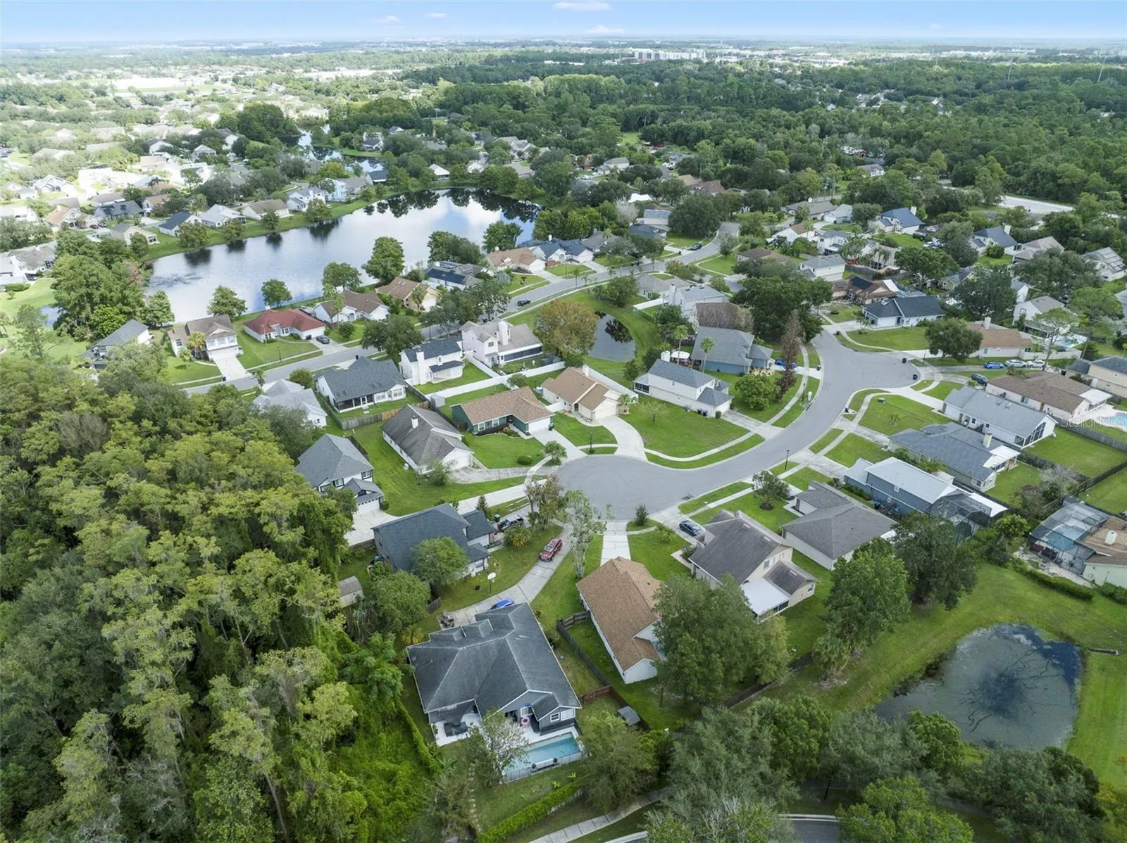 Aerial view of the home and community