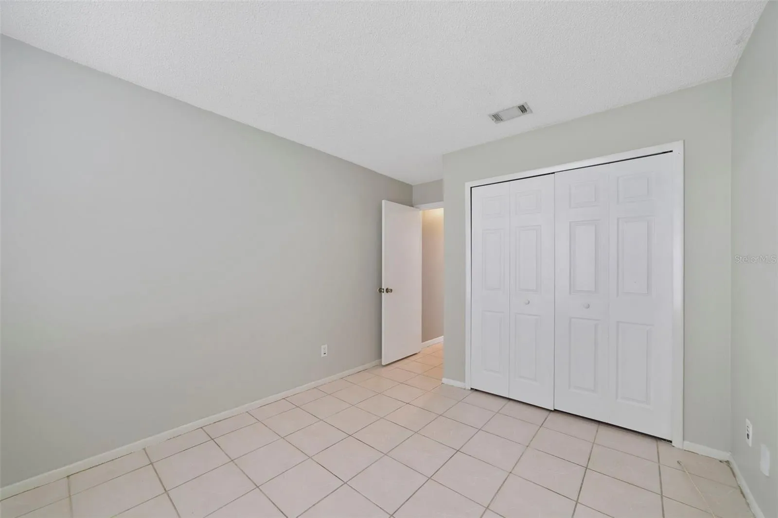 Bedroom 2 offers flexibility for use as a guest room, home office or hobby space.