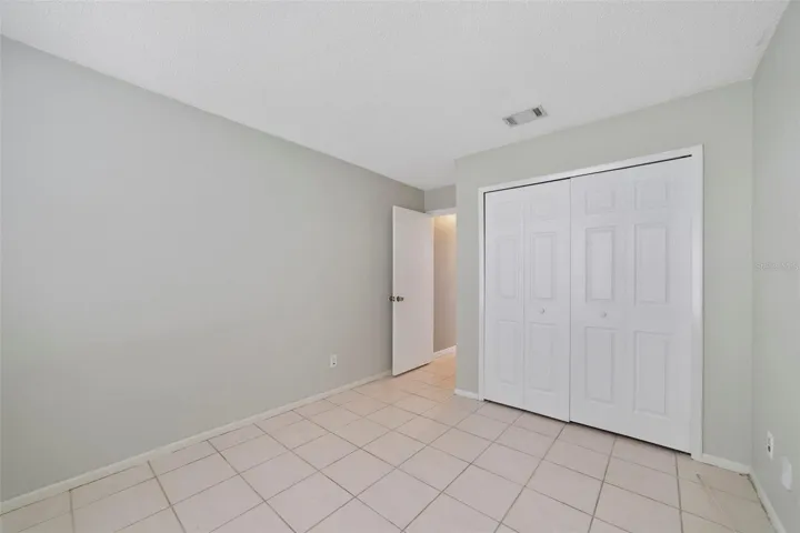Bedroom 2 offers flexibility for use as a guest room, home office or hobby space.