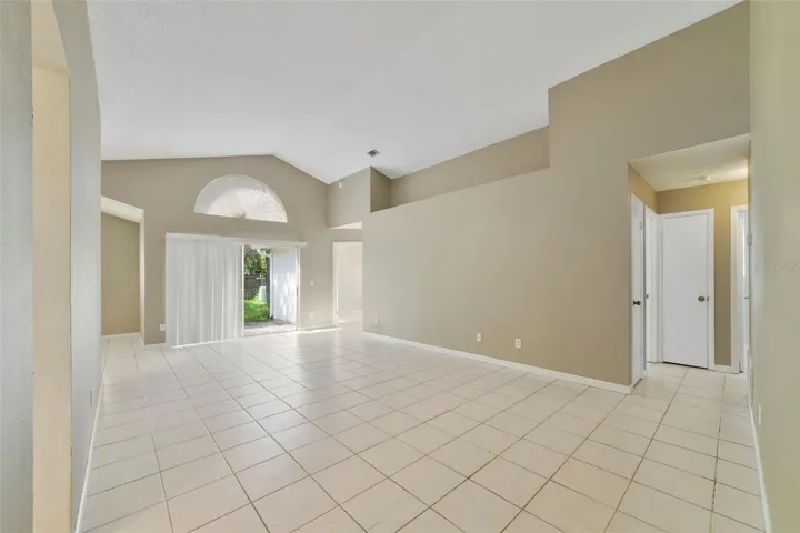 Step inside to a light and inviting floor plan featuring CERAMIC TILE FLOORING THROUGHOUT—NO CARPET!
