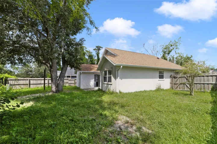 Step outside from the Living Room or Primary Bedroom and enjoy your own PEACEFUL OUTDOOR SPACE with nature offering a tranquil backdrop of CONSERVATION AND POND VIEWS.