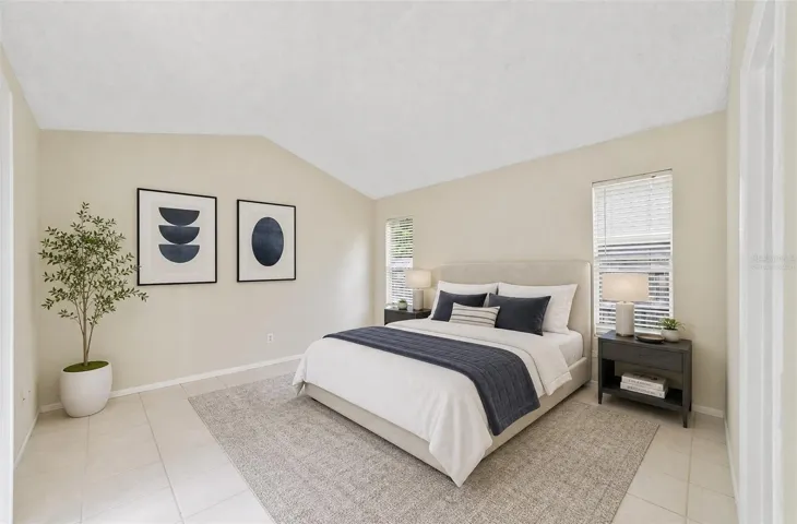 The desirable SPLIT-BEDROOM FLOOR PLAN provides privacy for the Primary Suite, which is tucked away from the secondary bedrooms and features its own DIRECT ACCESS to the back patio and yard. Virtually Staged