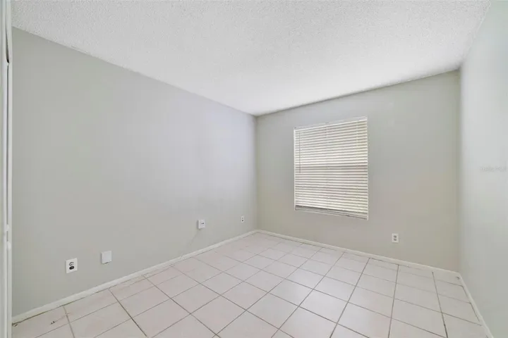 Bedroom 2 offers flexibility for use as a guest room, home office or hobby space.