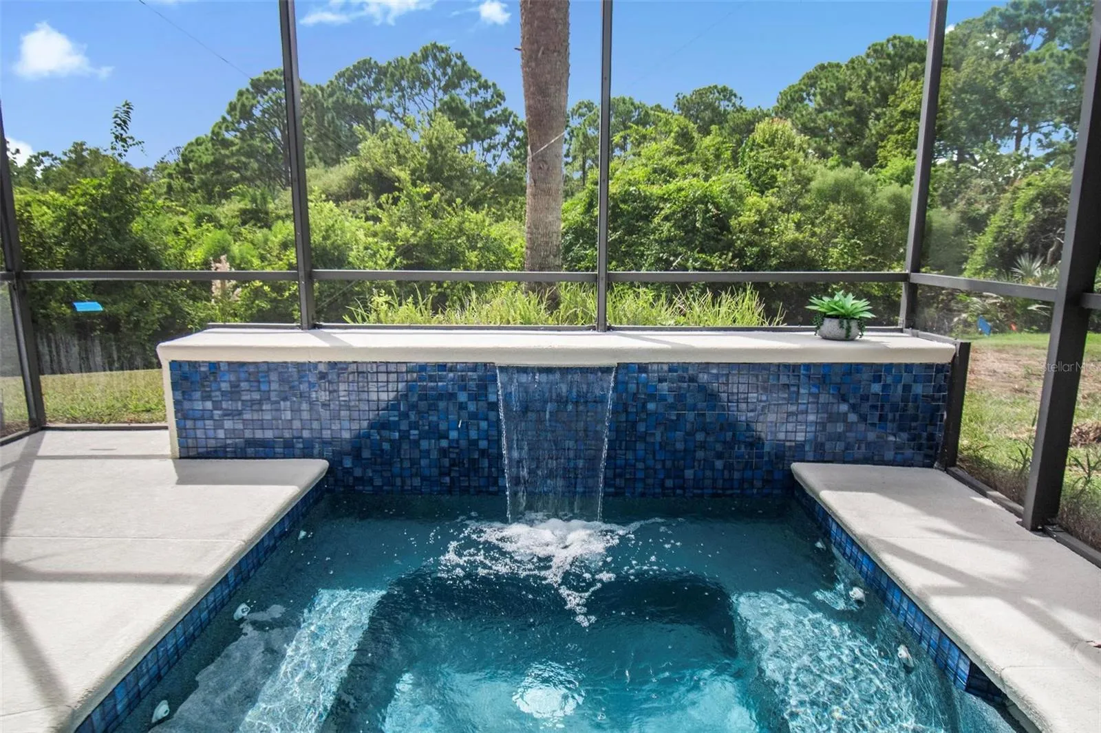 The spool with is a spa/pool has been resurfaced and retiled, Our pool guy will show the new buyer how to use everything and the tranquility of the waterfall