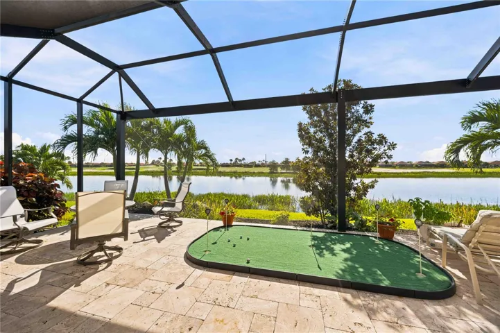 Extended lanai on water with spa and Hurricane Screens.