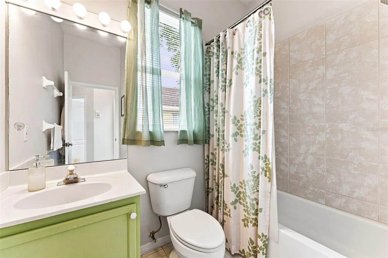 Full bathroom with tub