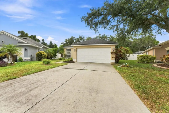 Extra long driveway leading to 2 car garage