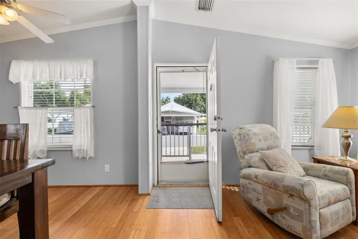 Vaulted ceilings, fans, and bamboo flooring in the open living space