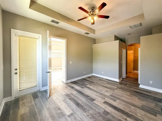 Primary bedroom with access to the patio