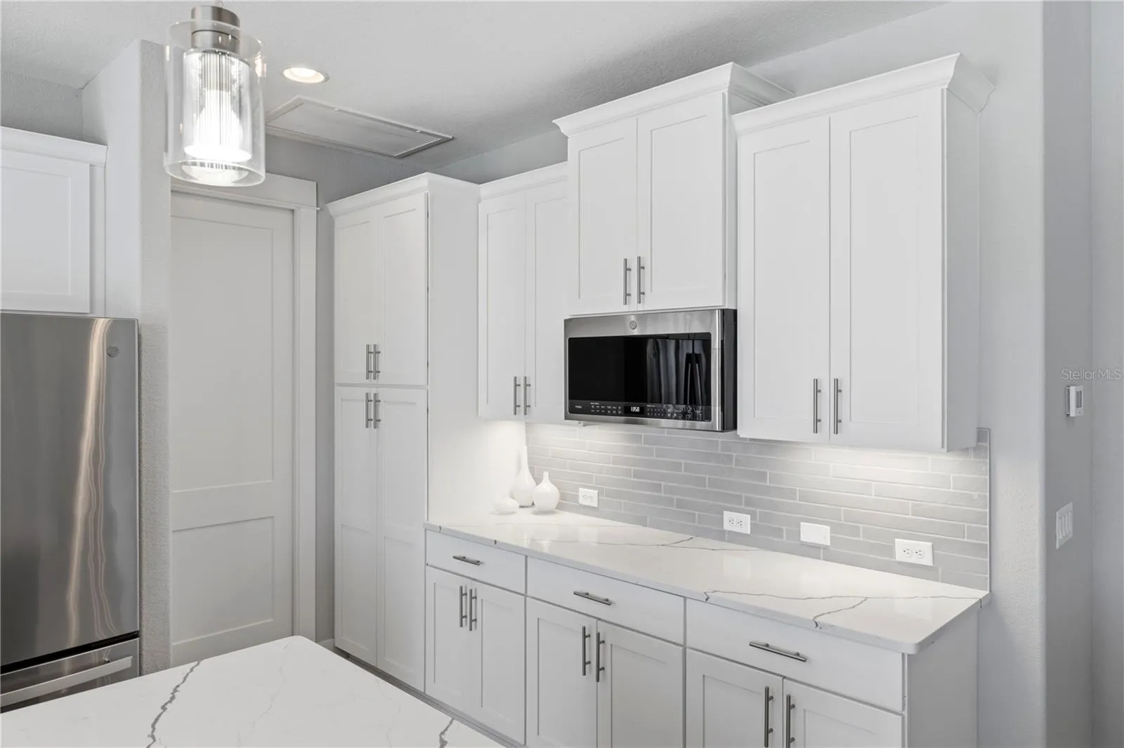 Side buffet with pantry and more cabinets