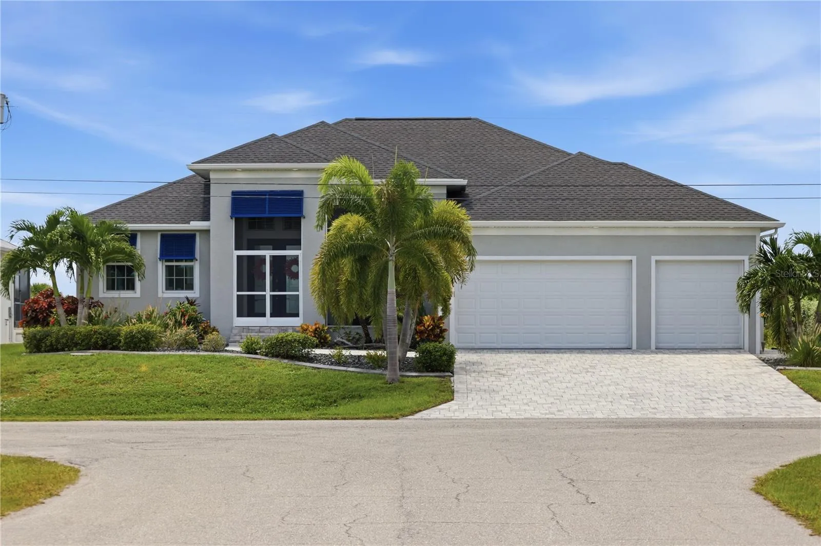 3 car garage and paver driveway