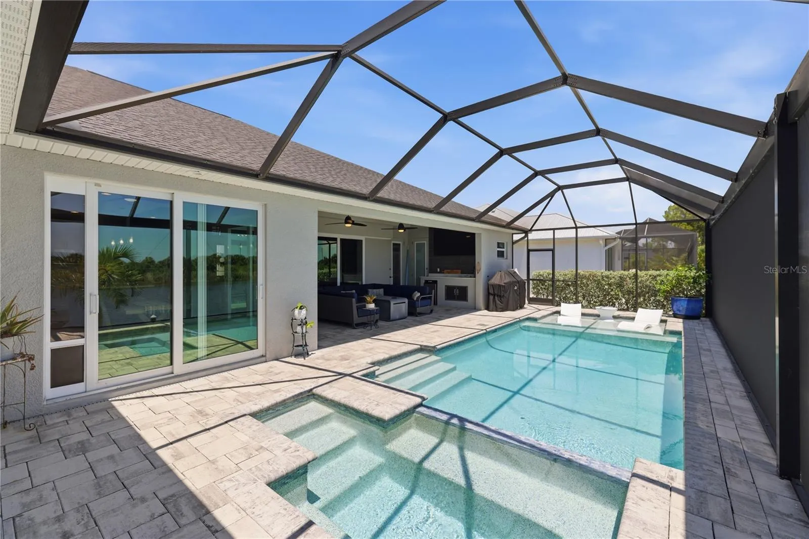 Shows the whole pool from the extra space on lanai