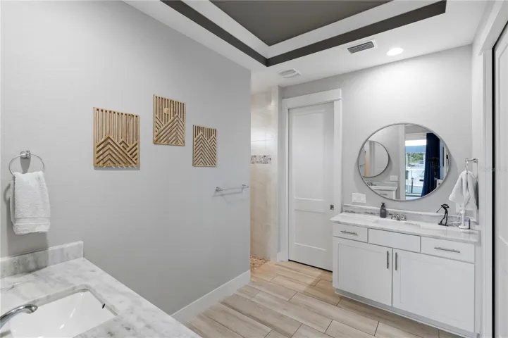Primary Bathroom, with Separate Sinks and Cabinets