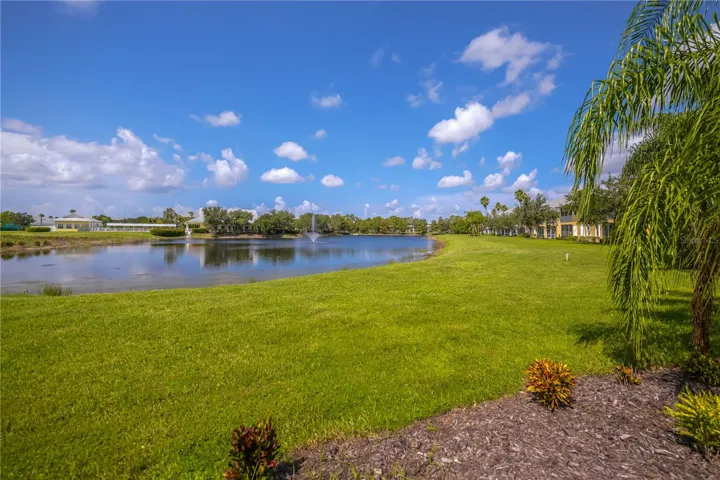 Sensational sunset hues over the lake while the gentle fountain sounds are what you will enjoy from your private lanai.