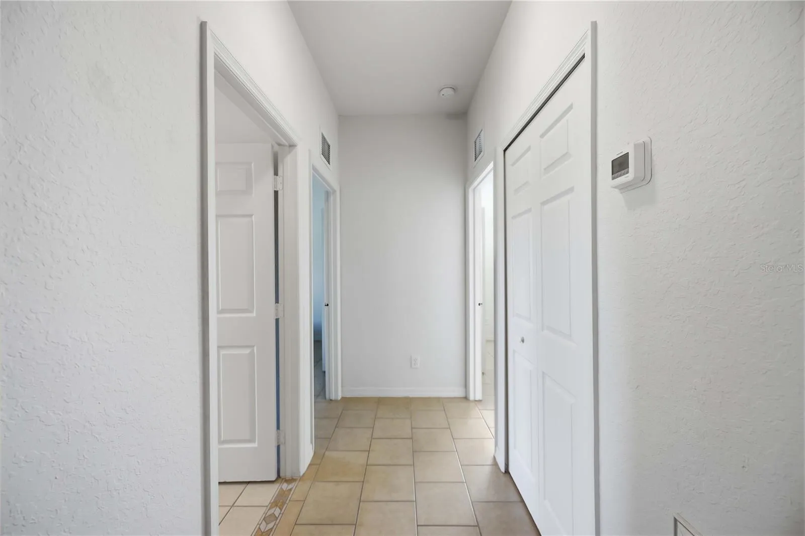 Split floor plan, hallway to the two bedrooms