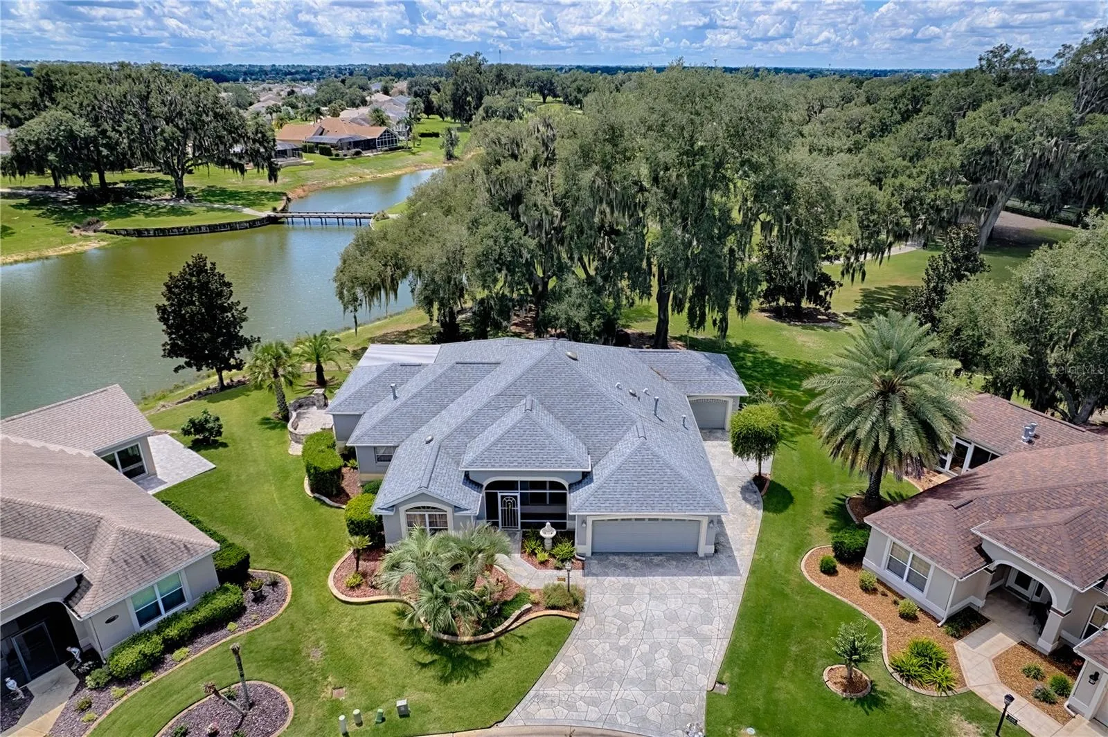 Front View of home and Beautiful view of pond and golf course in back