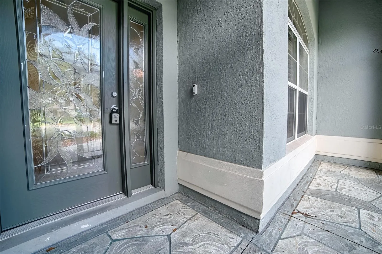 Front Door / porch area enclosed in screen
