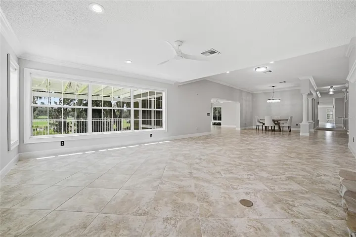 Living area looking toward dining are and outside