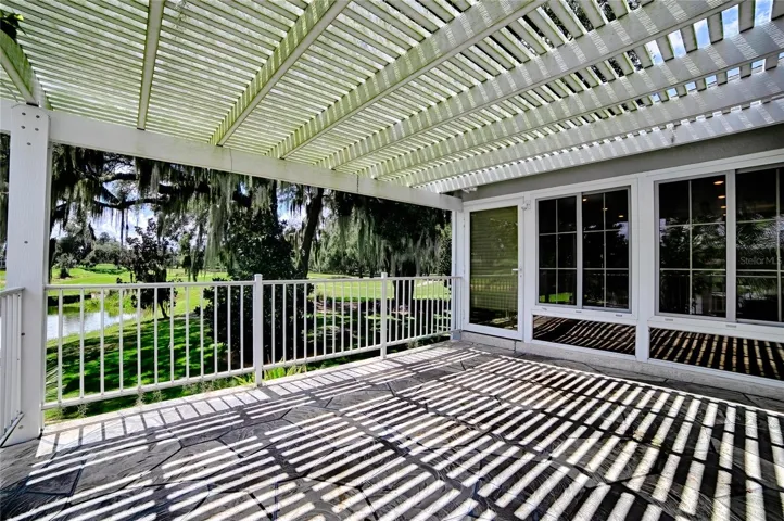 Pergola over back yard porch