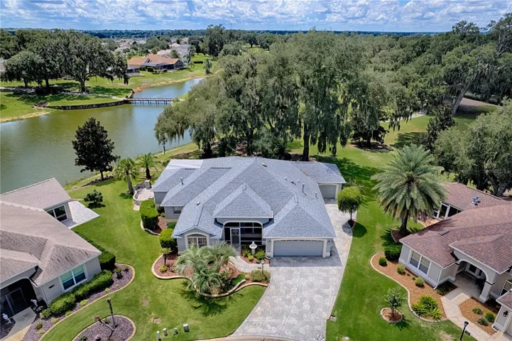 Front View of home and Beautiful view of pond and golf course in back