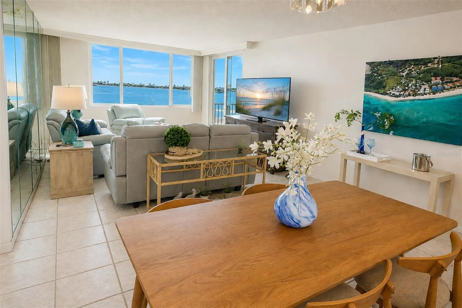 Bright Coastal Living Room with Panoramic Waterfront Views