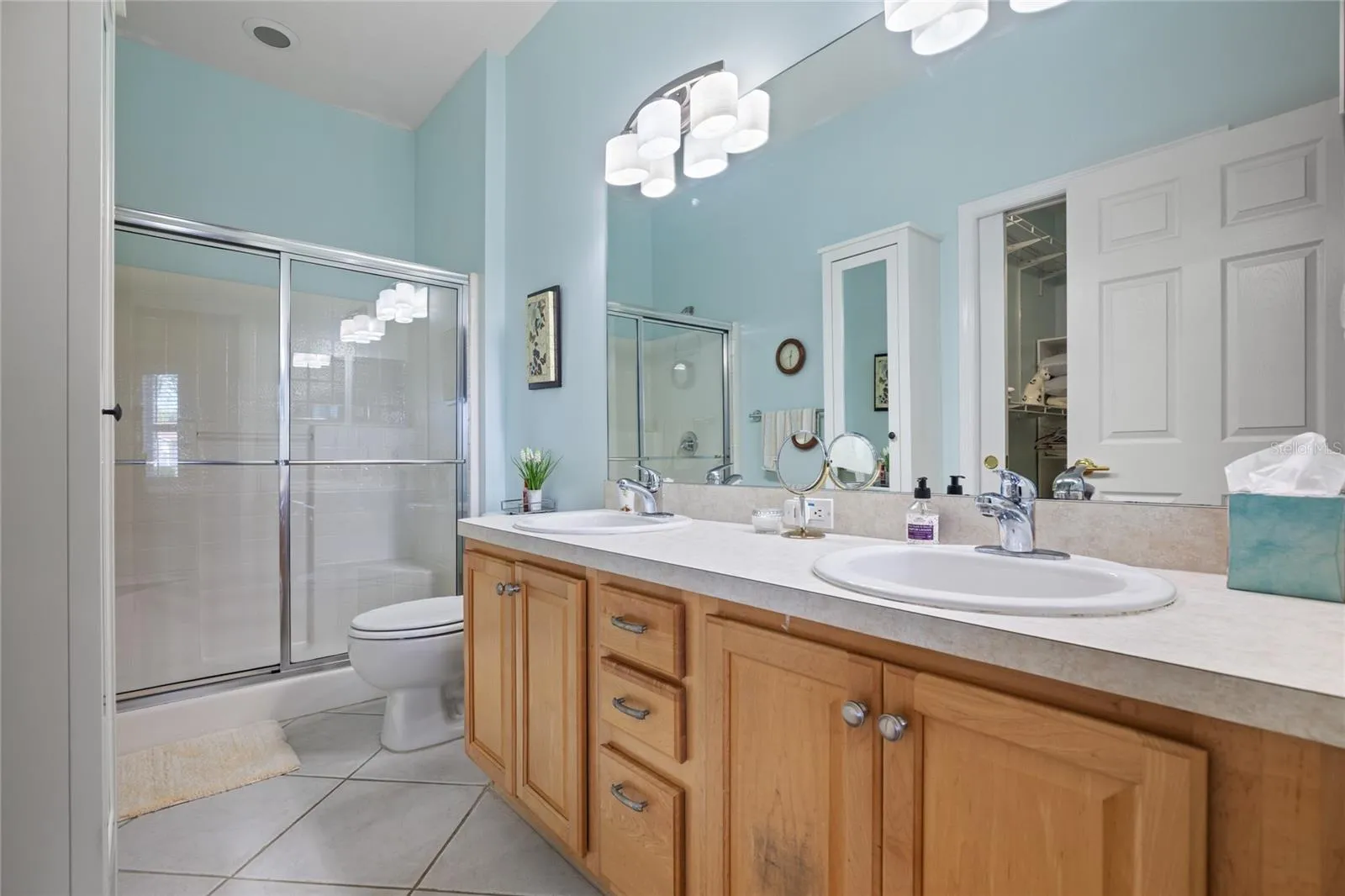 PRIMARY BATHROOM/DOUBLE SINKS.  WALK-IN SHOWER.