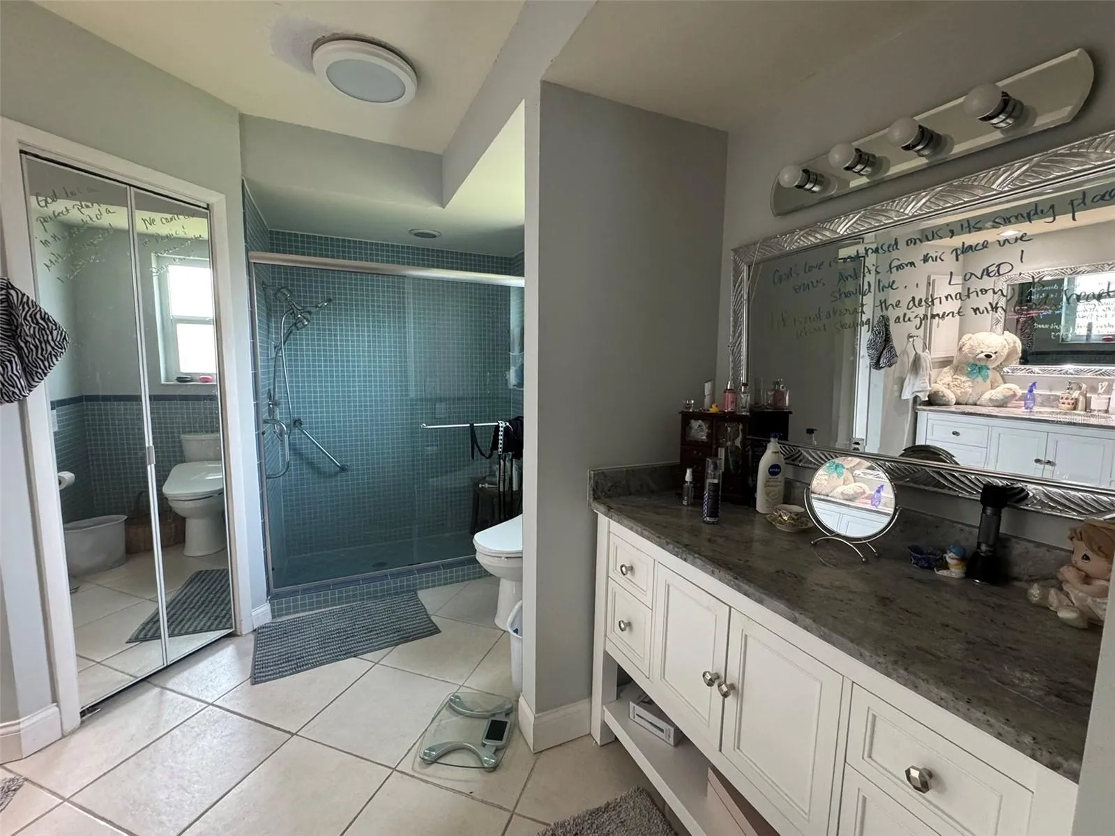 primary en-suite bath with separate vanities