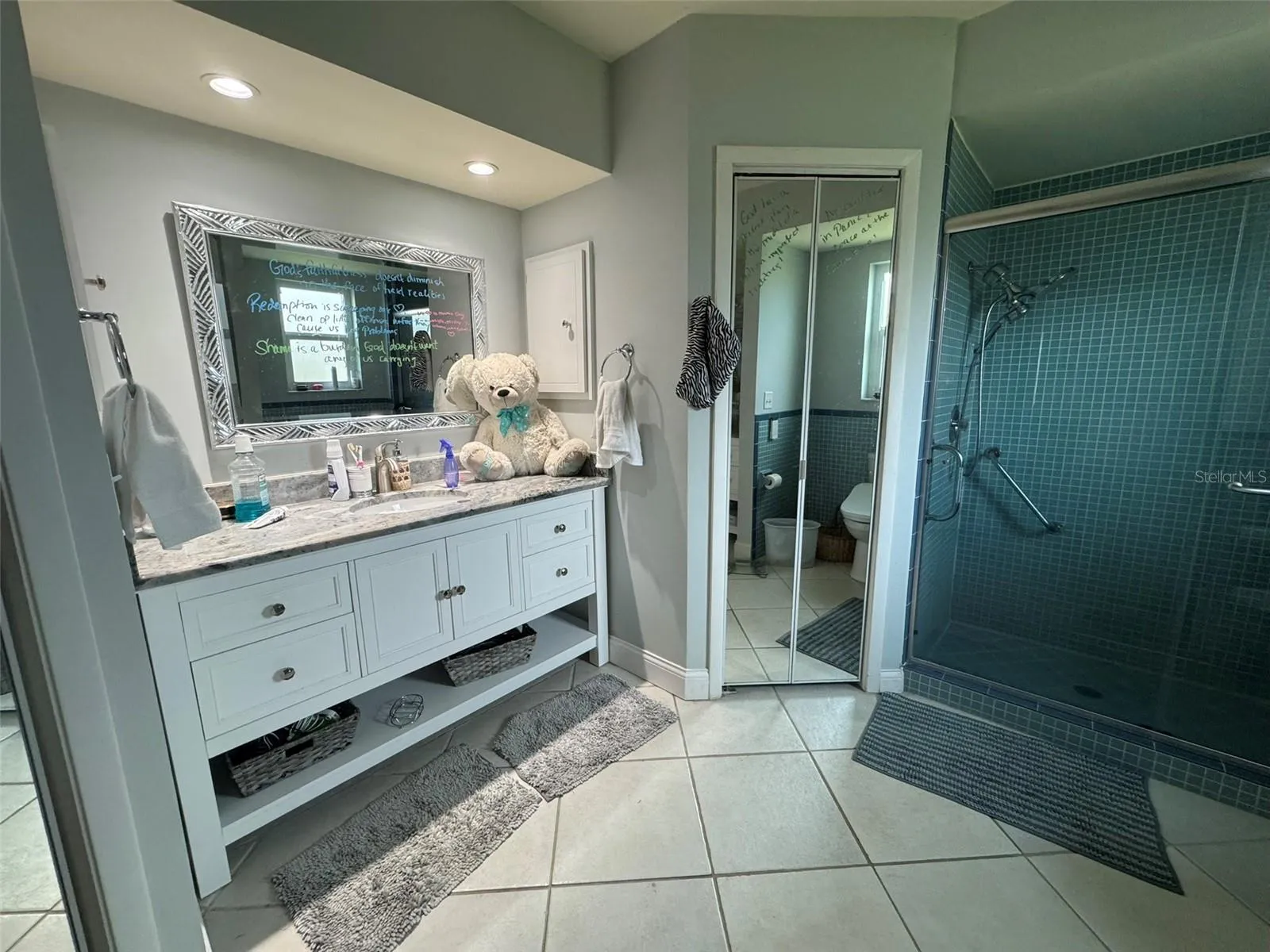 primary en-suite bath with separate vanities