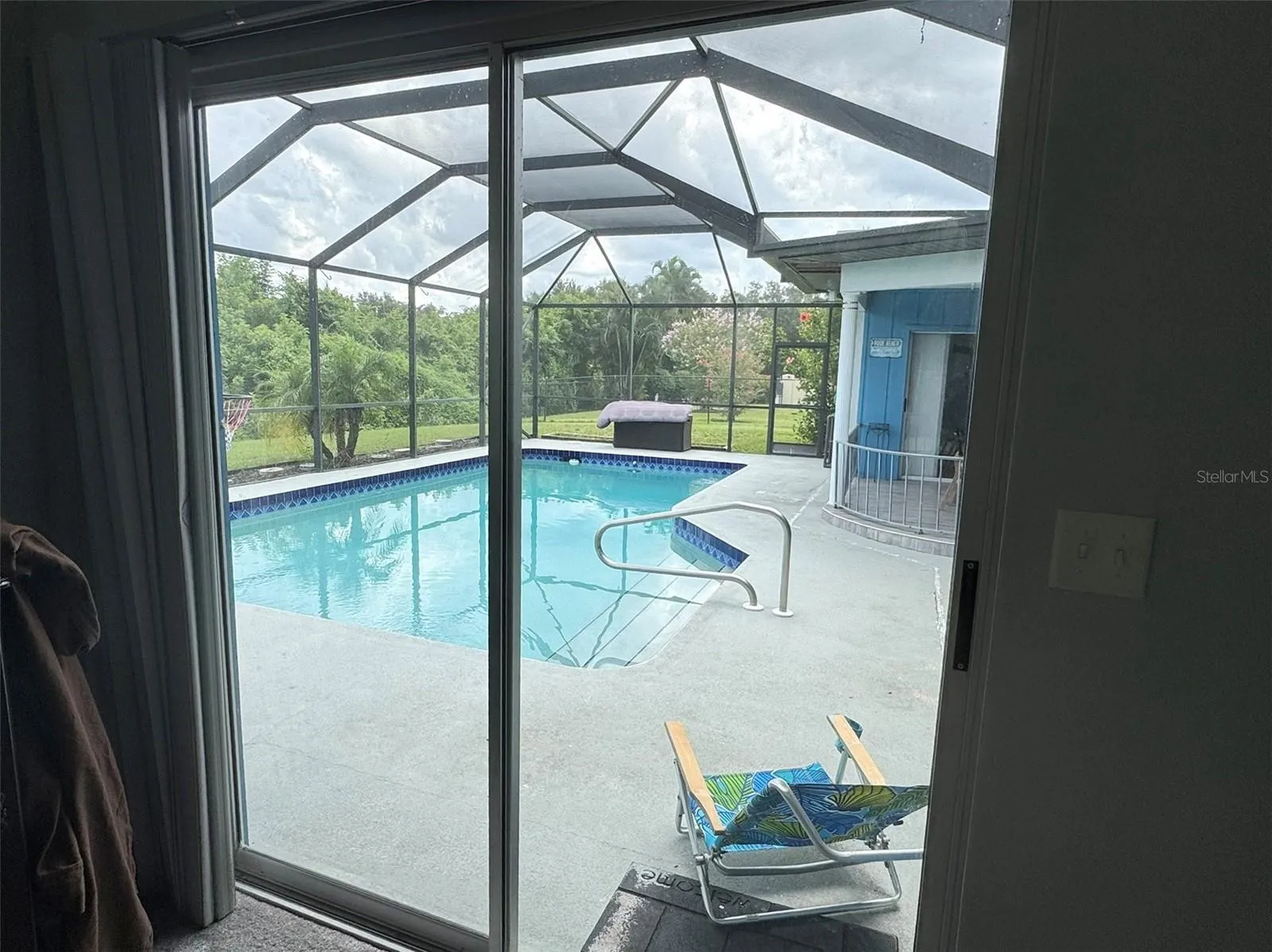 Primary bedroom slider onto pool deck