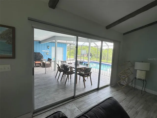 family room overlooking pool deck