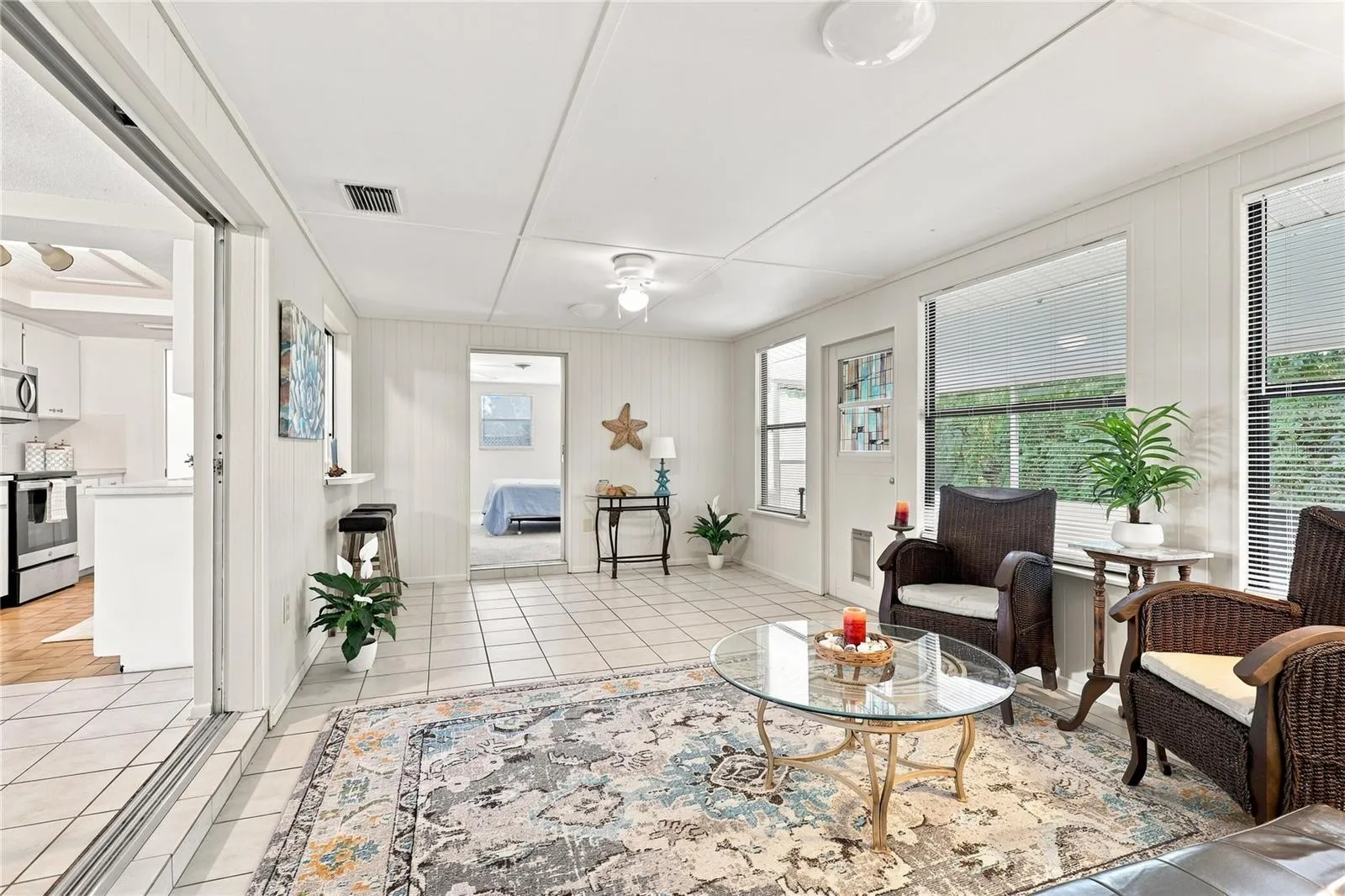 Large 19X12 extra Living Area that leads to the screened in Lanai and 2nd Bedroom
