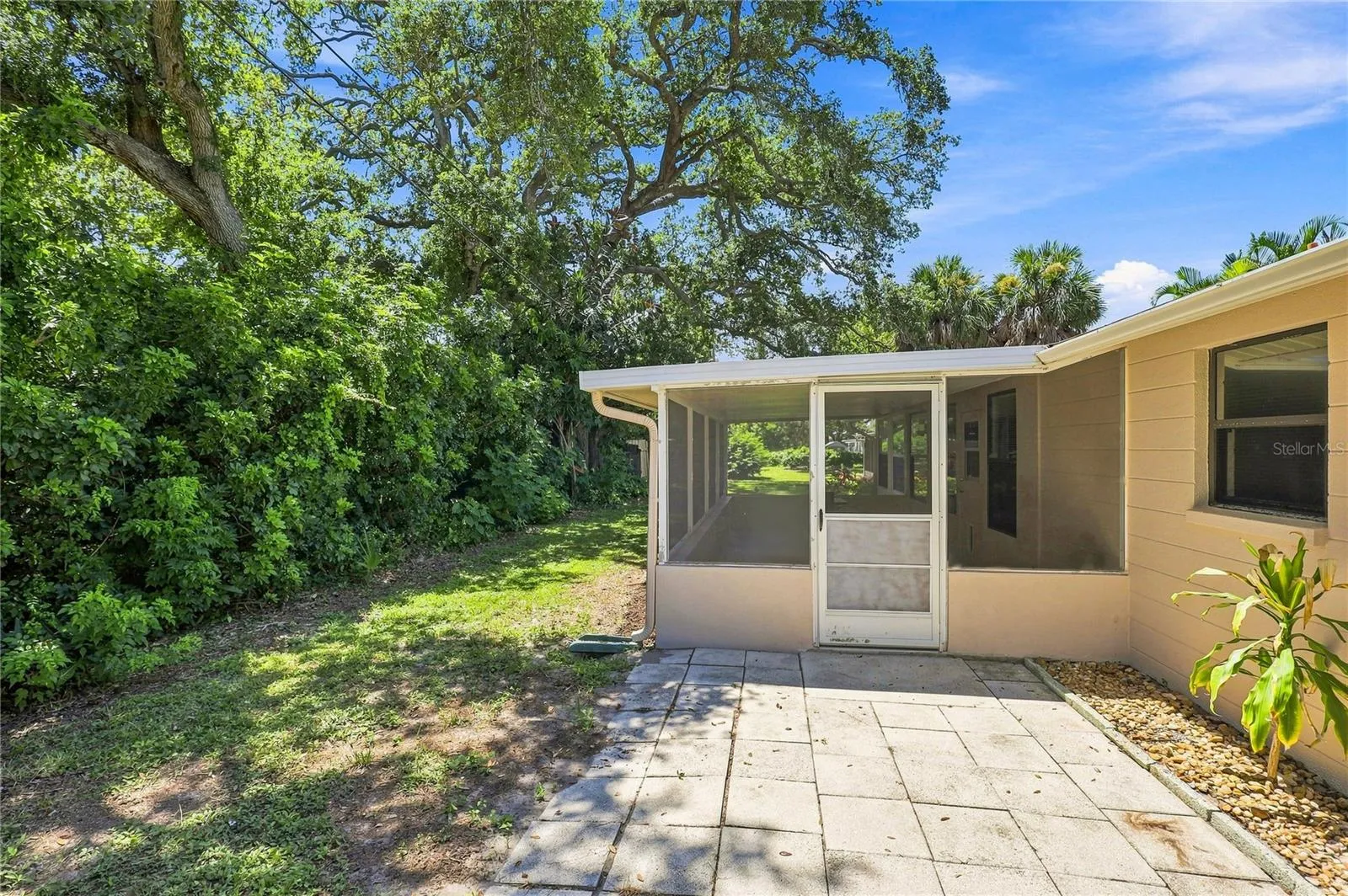 Backyard is private and partially fenced.