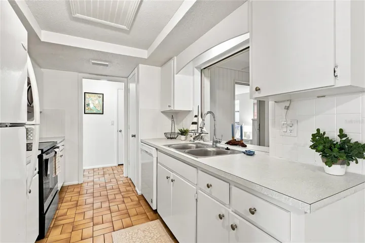 Kitchen with new sink, large closet pantry