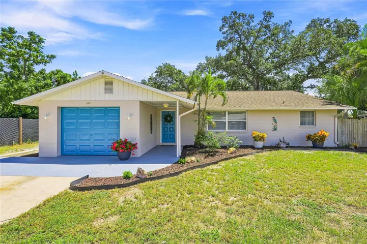 Welcome home to 411 Plantation Rd.  Freshly Painted Exterior, New Mulch and plants!