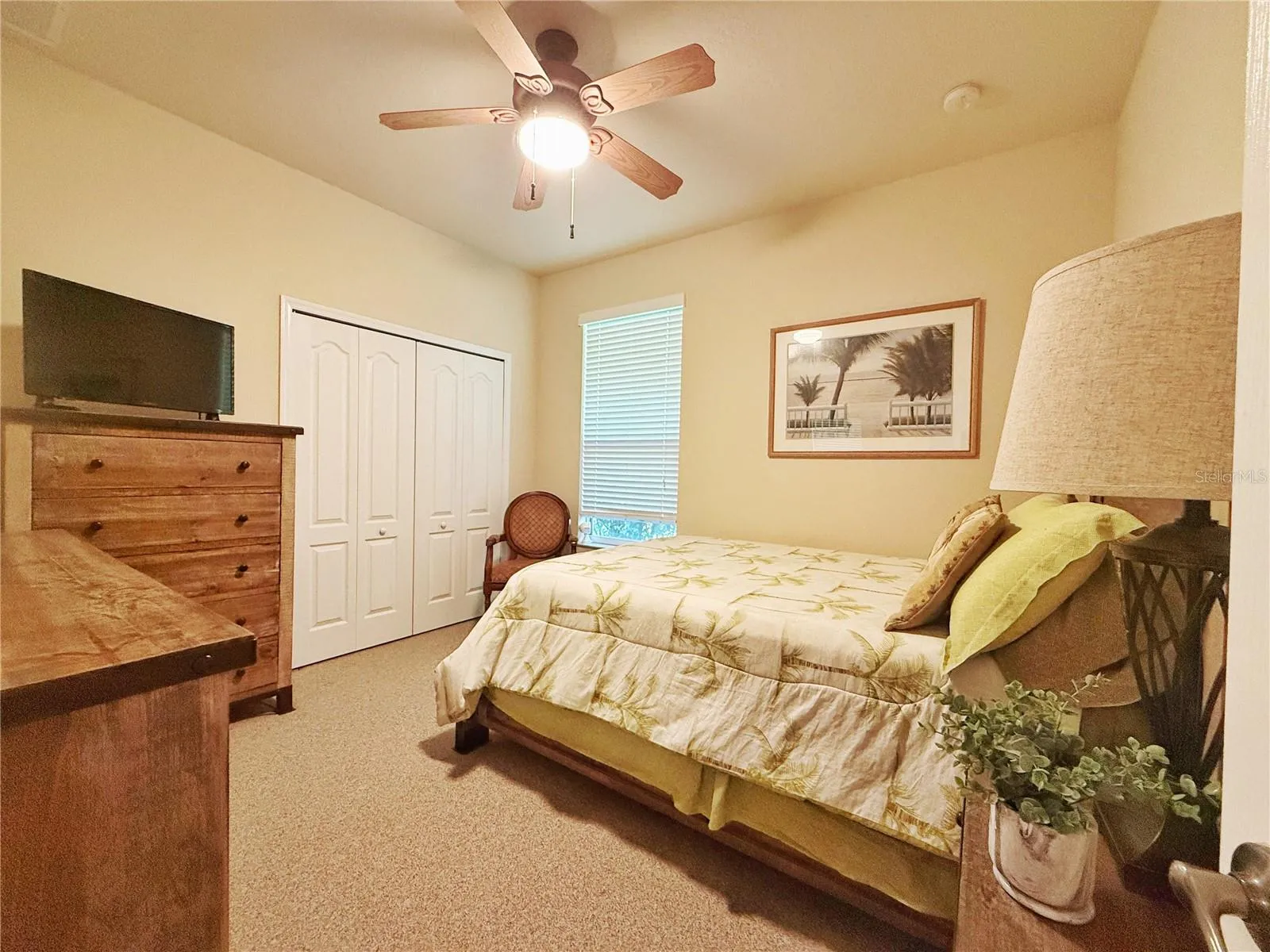 Bedroom 4 with built in closet, ceiling fan